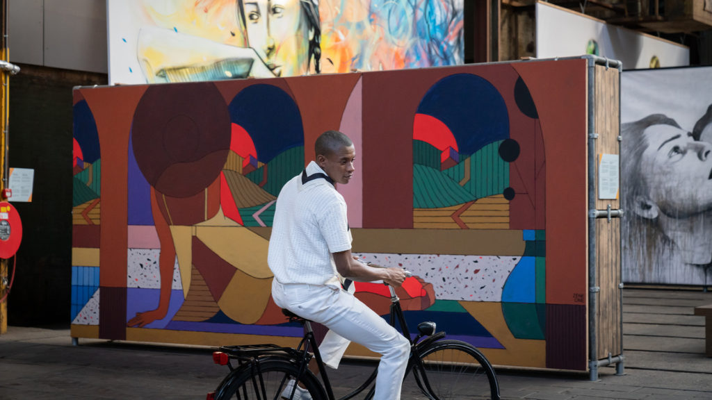 Man on bike in STRAAT Museum